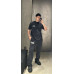 Balenci*ga Distressed Tape Logo Print Trousers