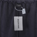 Balenci*ga Distressed Tape Logo Print Trousers