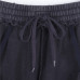 Balenci*ga Distressed Tape Logo Print Trousers