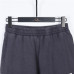 Balenci*ga Distressed Tape Logo Print Trousers