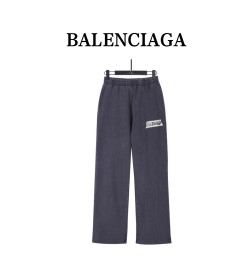 Balenci*ga Distressed Tape Logo Print Trousers