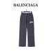Balenci*ga Distressed Tape Logo Print Trousers