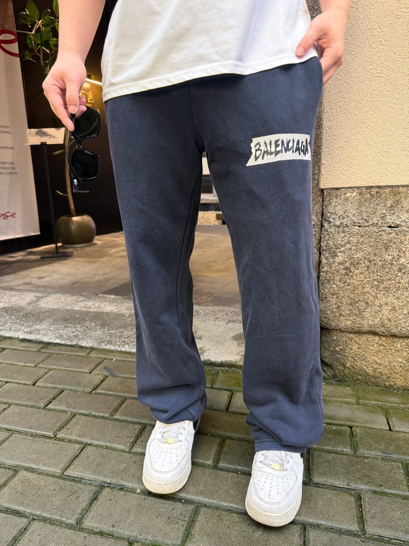Balenci*ga Distressed Tape Logo Print Trousers