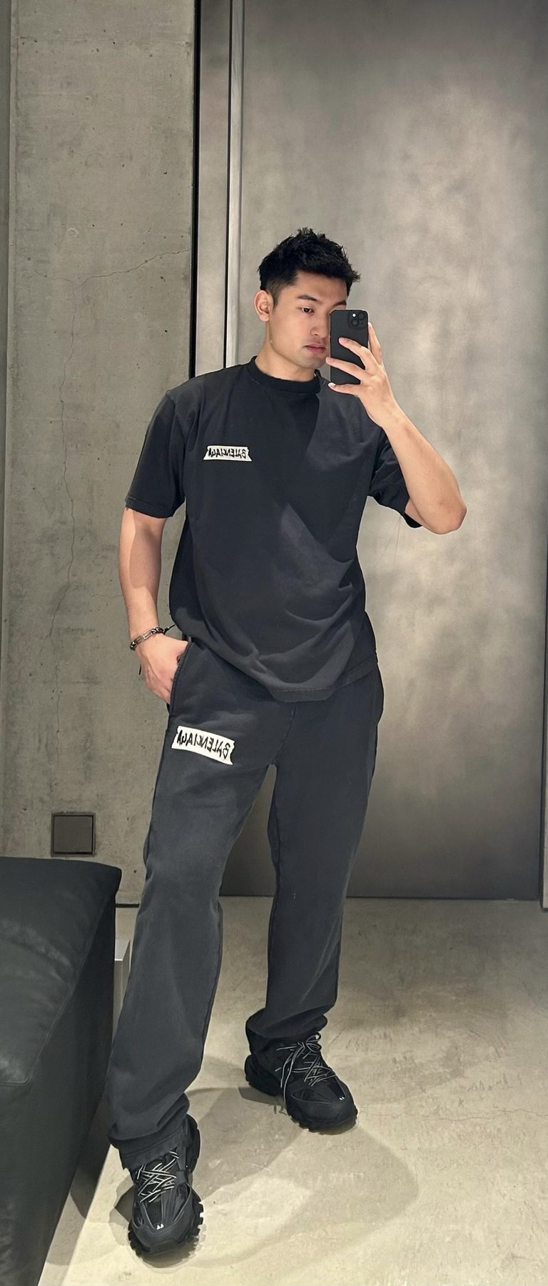 Balenci*ga Distressed Tape Logo Print Trousers
