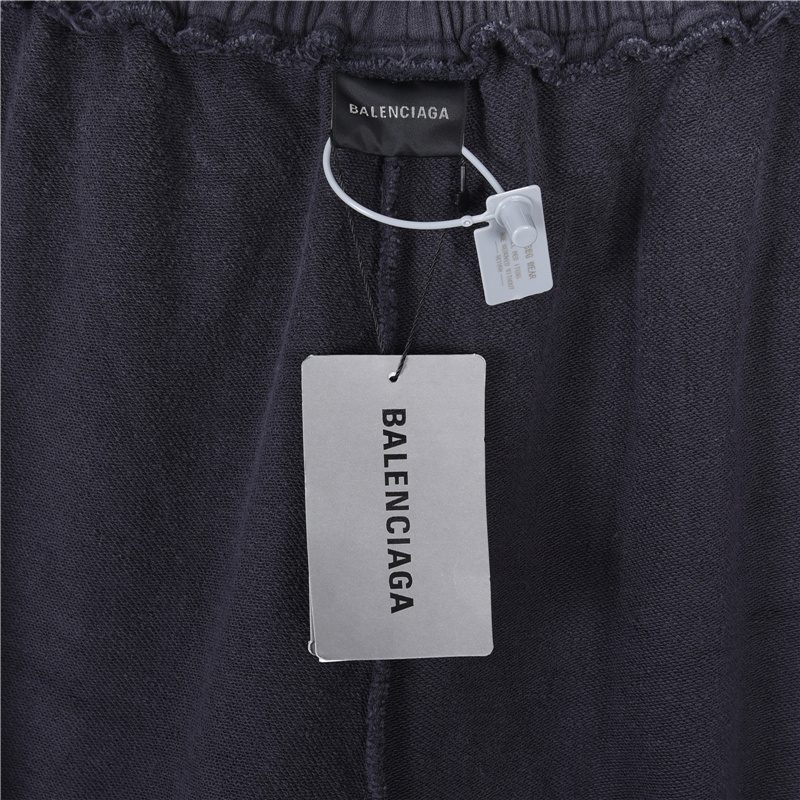 Balenci*ga Distressed Tape Logo Print Trousers