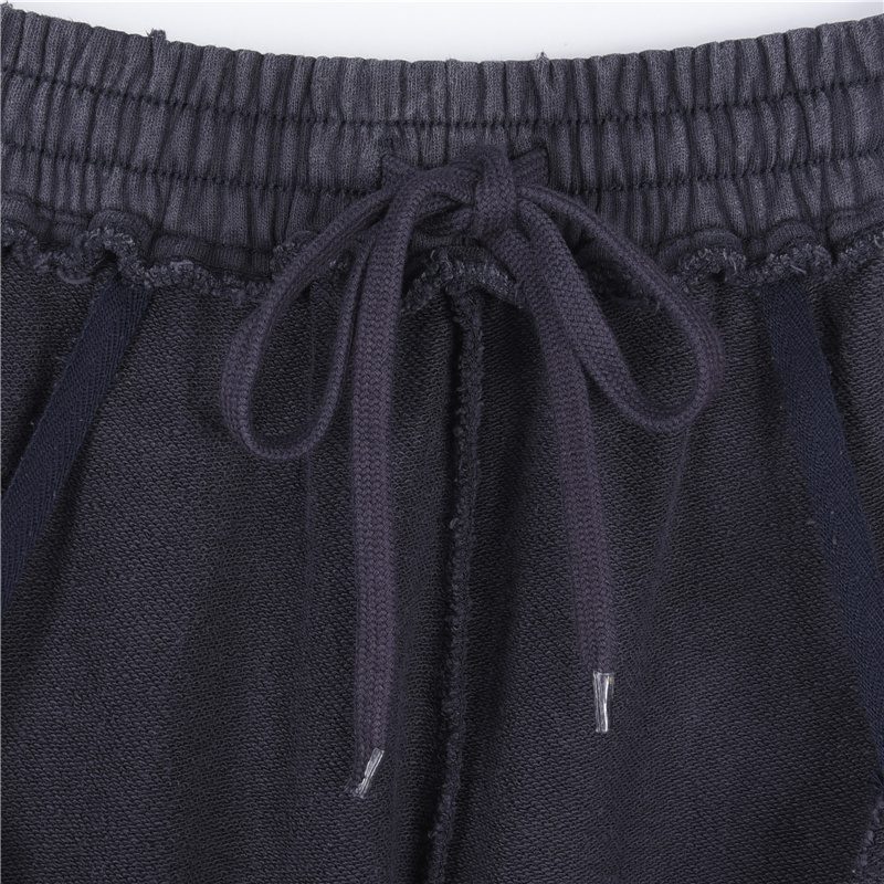 Balenci*ga Distressed Tape Logo Print Trousers