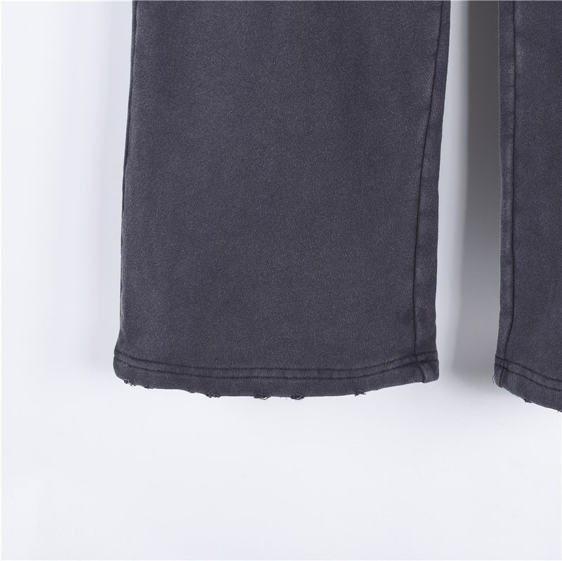Balenci*ga Distressed Tape Logo Print Trousers